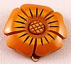 BP46 butterscotch bakelite flower dress clip